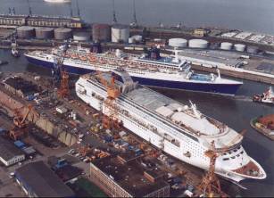 Norwegian Sky under construction with the Norway behind