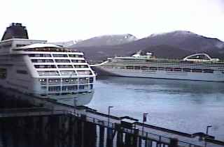 Picture from the Juneau Public Library Live Cam: The Norwegian Sky Docked with the Sun Princess going into the Franklin Street Dock (This is taken on the same day as the two ship cams below)